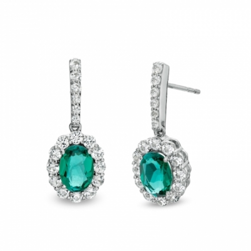 Серьги из серебра с изумрудом и белым сапфиром