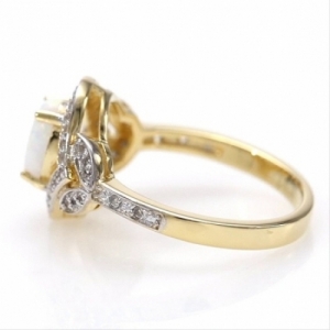 Женское кольцо из серебра 925 пробы с опалом и топазами