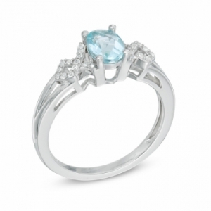 Женское кольцо из серебра с аквамарином и белым сапфиром