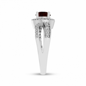 Женское кольцо из серебра с гранатом и белым сапфиром