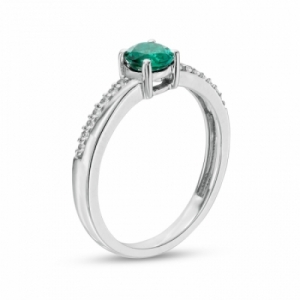 Женское кольцо из серебра с изумрудом и белым сапфиром