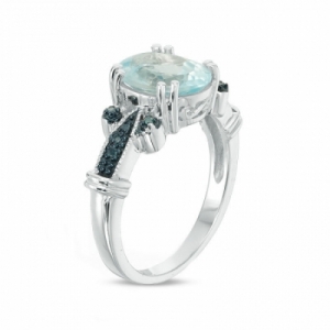 Женское кольцо из серебра с топазом и голубым бриллиантом