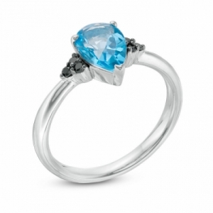Женское кольцо из серебра с топазом и черным бриллиантом